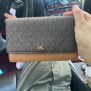 Michael Kors never used.